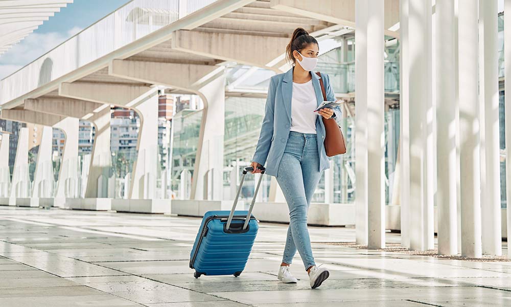 A Girl Walking with a Luggage