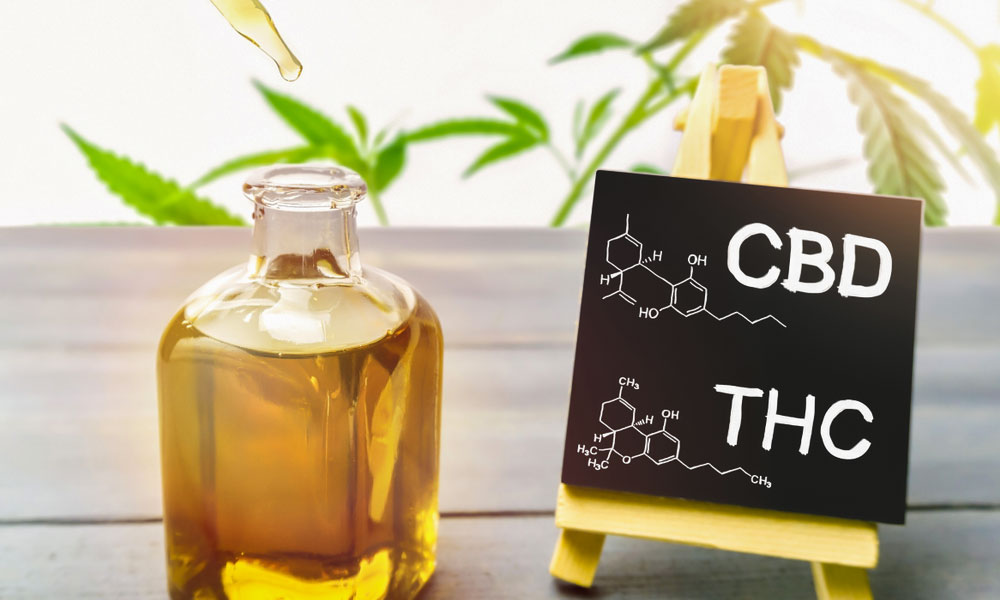 CBD and THC compounds and a CBD oil jar